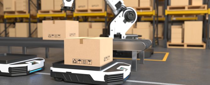 Robotic arm and autonomous mobile robots handling shipping boxes in a warehouse, representing automation in import management through CBP’s Automated Commercial Environment (ACE)