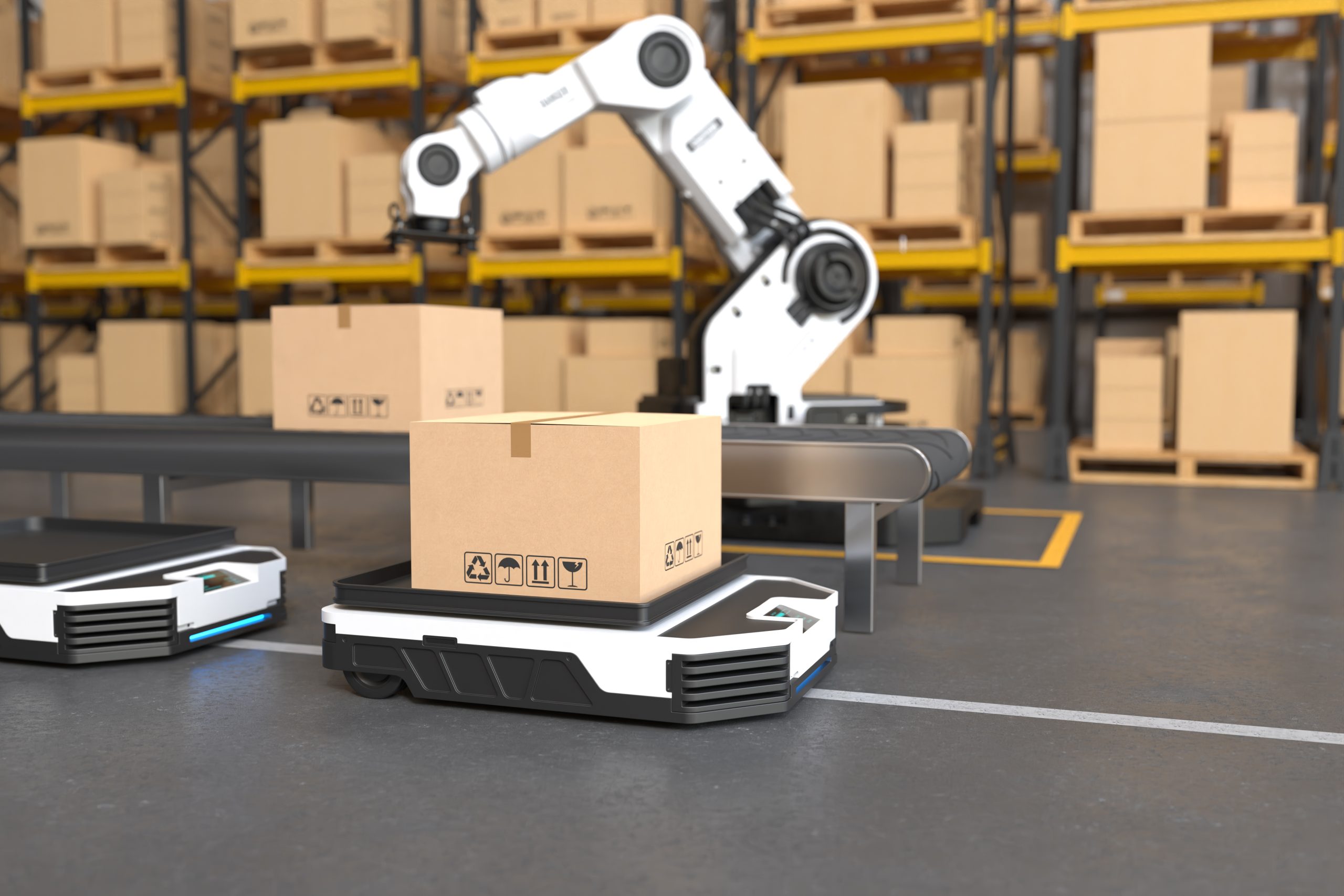 Robotic arm and autonomous mobile robots handling shipping boxes in a warehouse, representing automation in import management through CBP’s Automated Commercial Environment (ACE)
